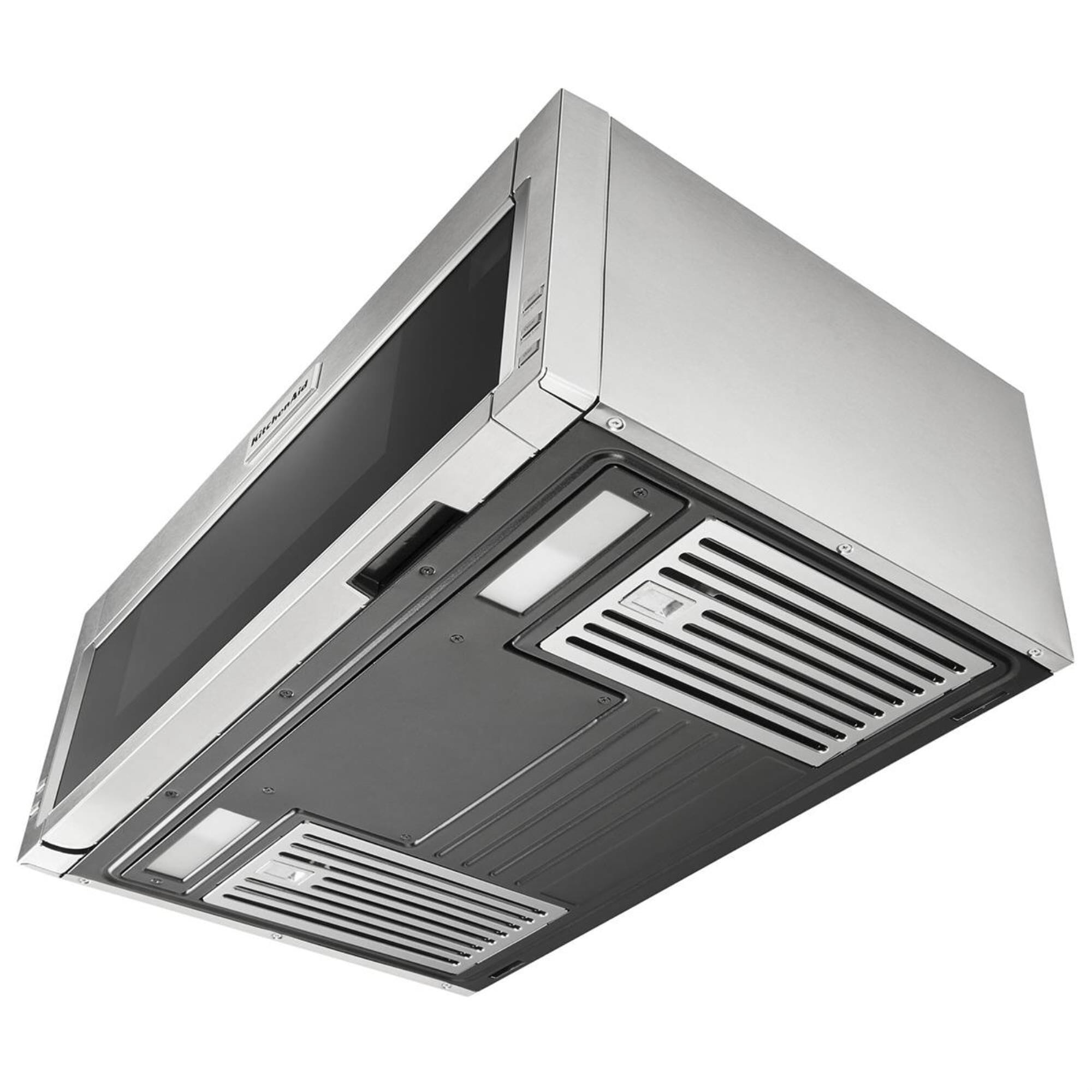 Low profile outlet microwave hood combination