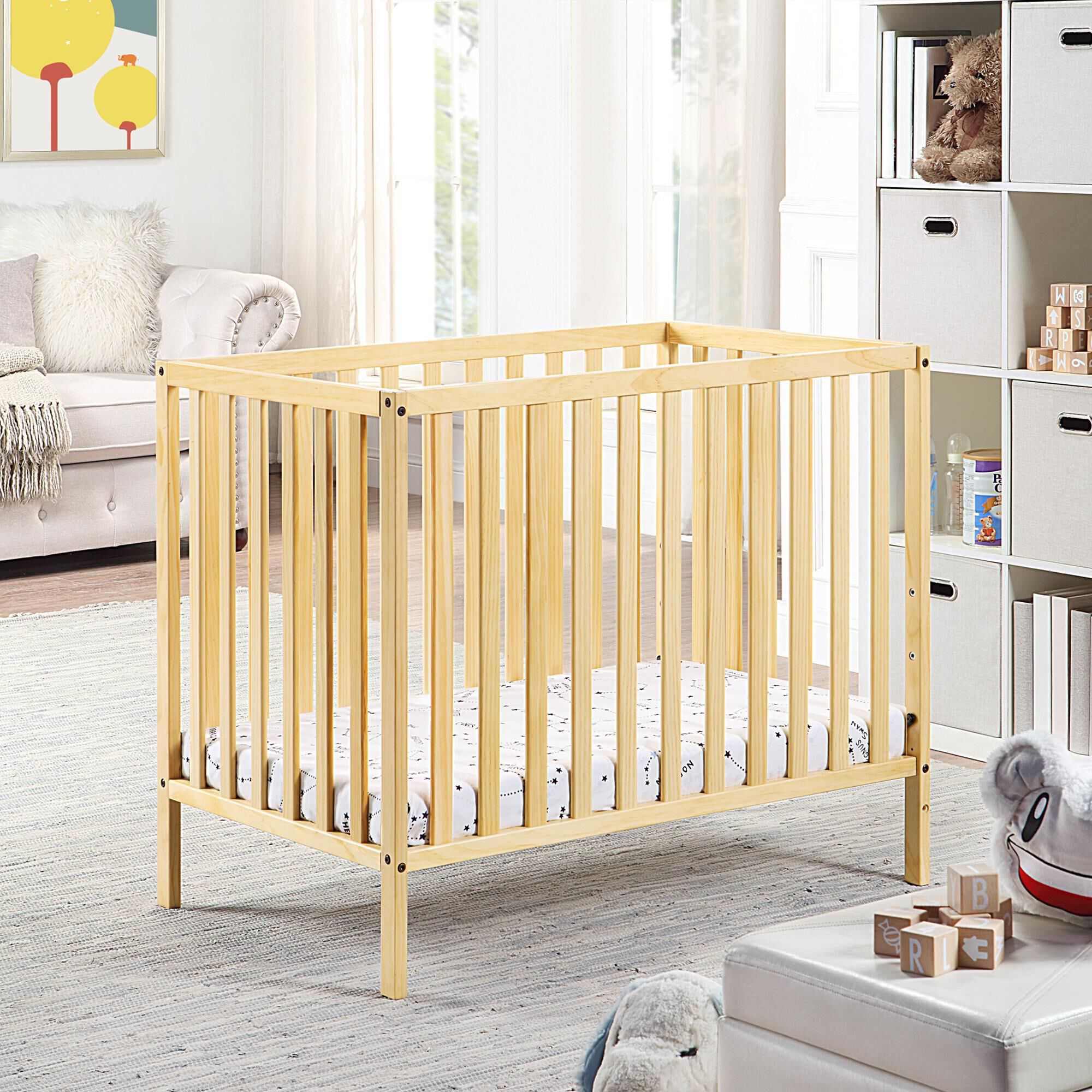 Mini crib natural wood discount