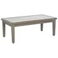 Ashley Rainier Ranch Patio Rectangular Cocktail Table in Brown and Beige, , large