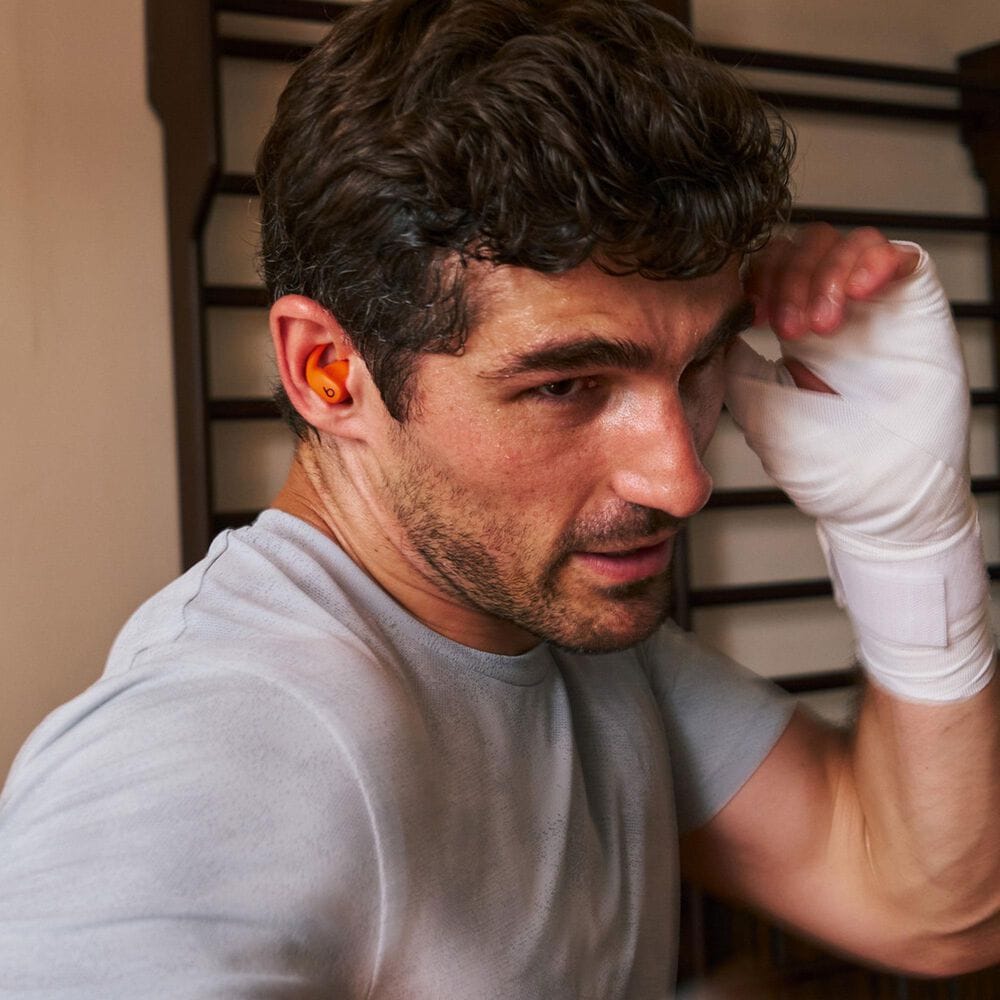 Beats Powerbeats Fit - Wireless Noise-Cancelling Workout Earbuds with Ultimate Secure Fit in Spark Orange, , large