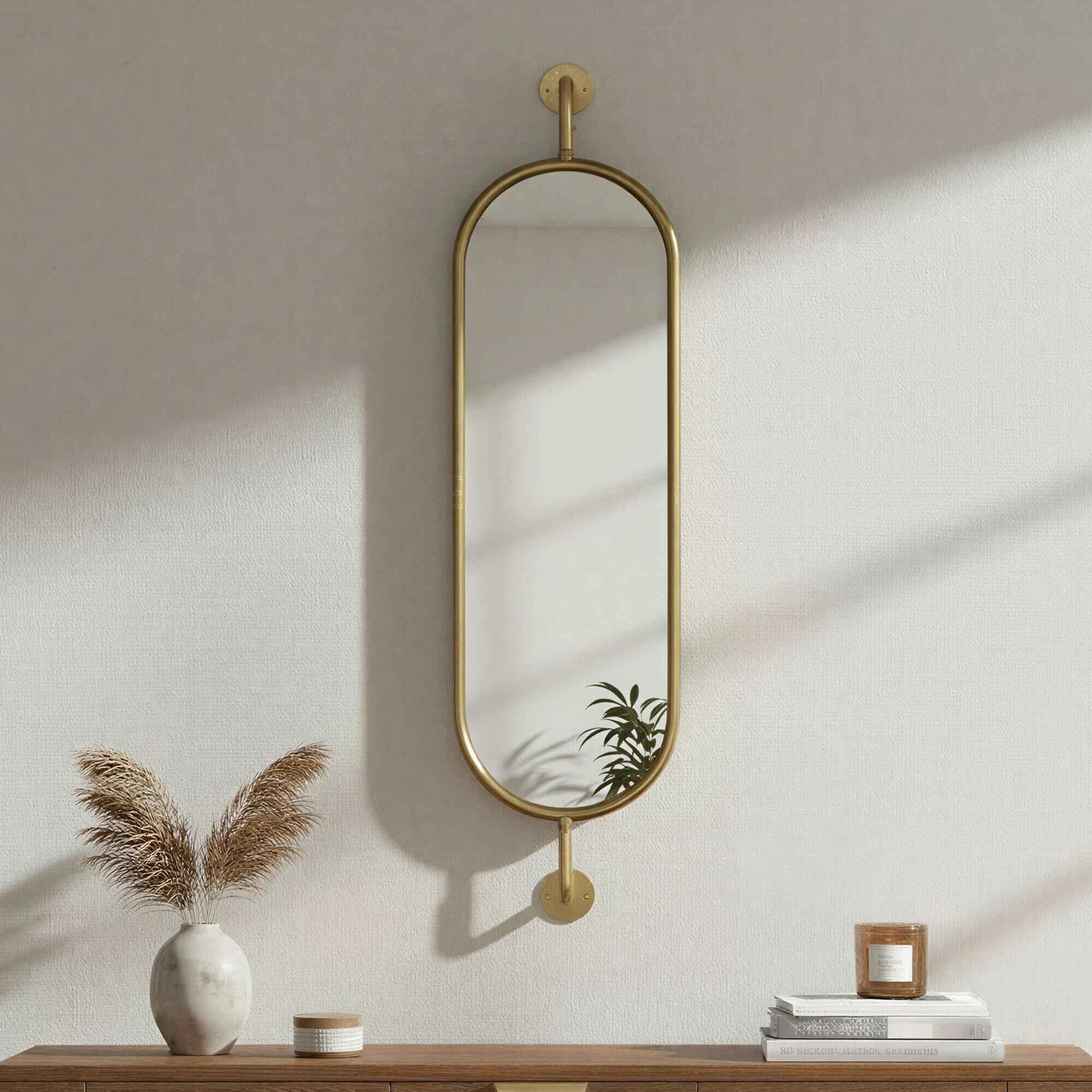 Creative Coop Oval Metal Framed Wall Mirror with Brackets in Gold