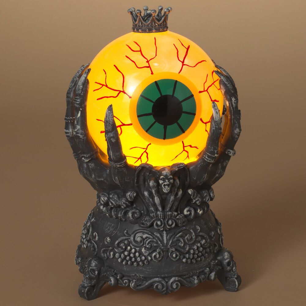 The Gerson Company 9.4&quot; Lighted Spinning Halloween Smoky Water Globe on Hand Base in Black and Yellow, , large