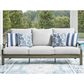 Ashley Rainier Ranch Outdoor Sofa with Beige Cushion in Brown, , large