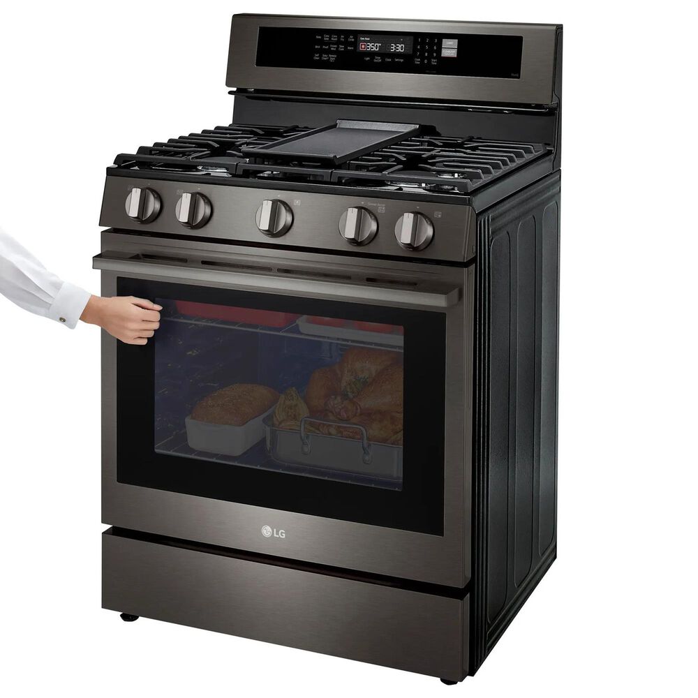 LG 2-Piece Kitchen Package with 6.3 Cu. Ft. Smart Freestanding Gas Range and 2.1 Cu. Ft. Smart Over-the-Range Microwave in Black Stainless Steel, , large