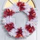 The Gerson Company 24" Pre-Lit Artificial Pine Christmas Wreath with Multicolor LED Lights in Red and White, , large