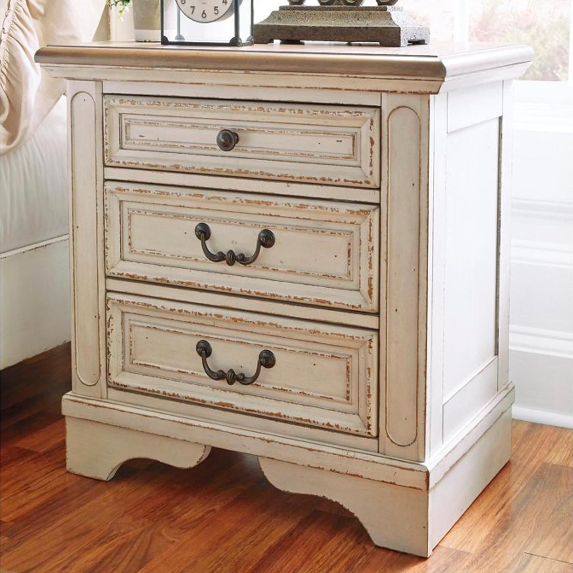 Signature Design by Ashley Realyn 3 Drawer Nightstand in Chipped