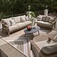 Ashley Harmony Headlands Outdoor Loveseat with Cushion in Natural and Gray, , large