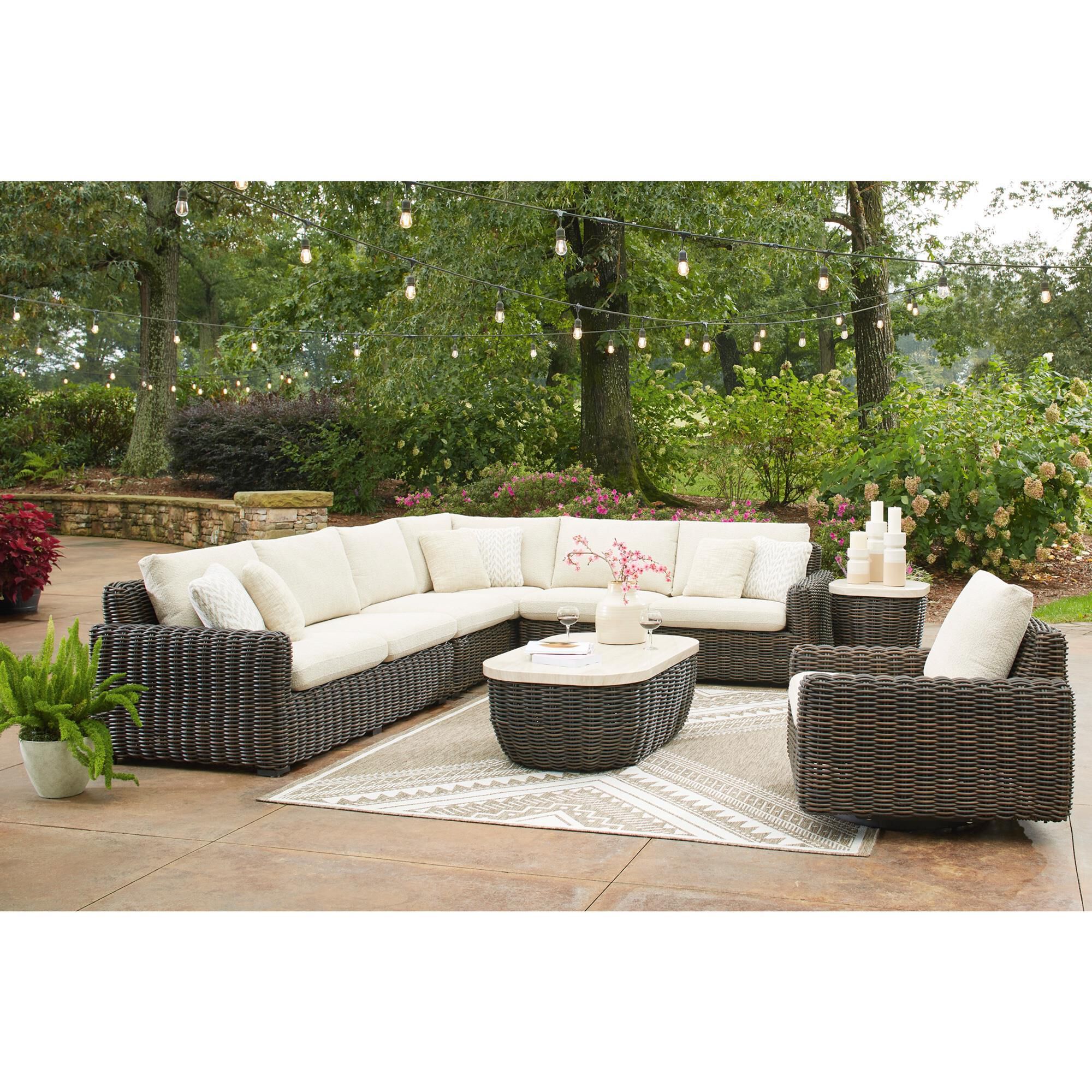 Ashley Kimora Swivel Glider Lounge Chair in Beige