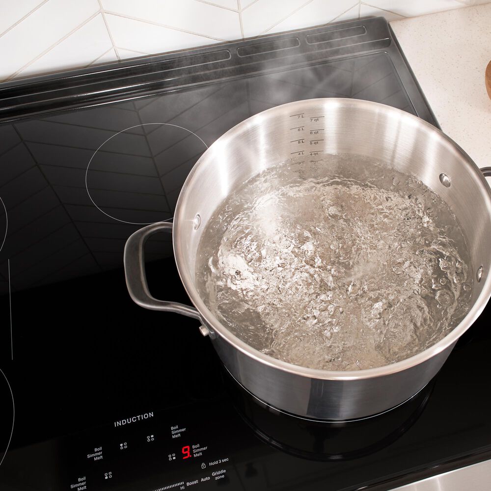 Whirlpool 2-Piece Kitchen Package with Black Stainless 6.4 Cu. Ft. Induction Range and Fingerprint Resistant Stainless Steel 1.1 Cu. Ft. Flush Mount Microwave, , large