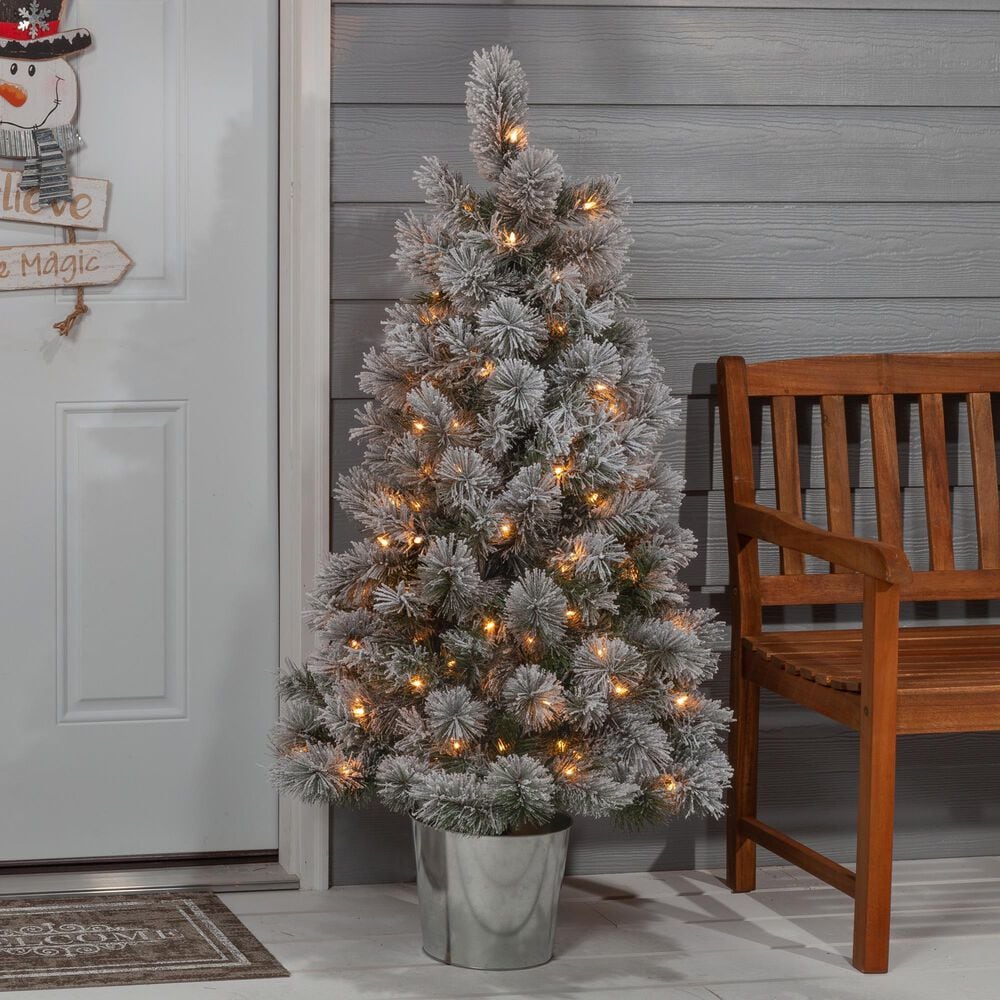 The Gerson Company 4.5&#39; Potted Pre-Lit Flocked Pine Artificial Needle Boise Pine with White Lights in Green, , large