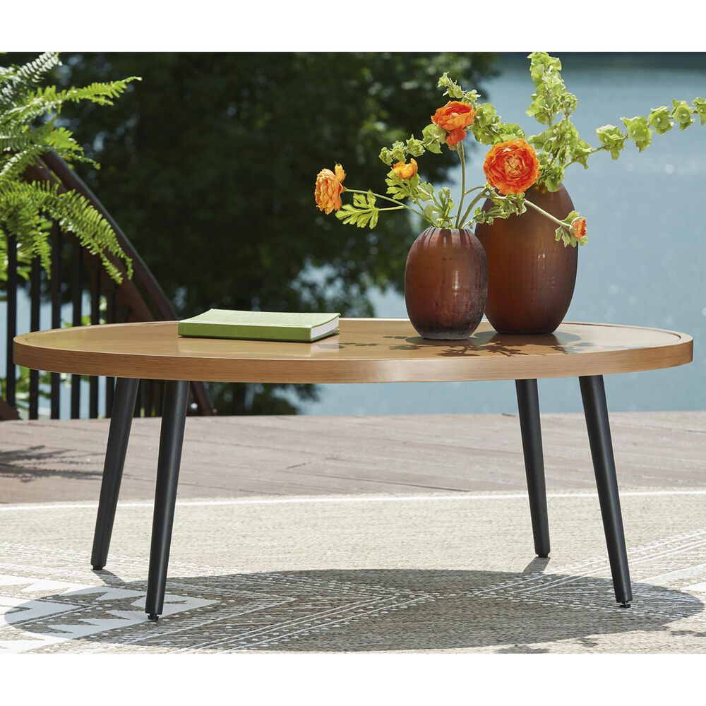 Ashley Horizon Hall Patio Oval Cocktail Table in Brown and Black, , large