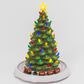 The Gerson Company Electric Lighted Musical Ceramic Christmas Tree with Moving Train in Green, , large