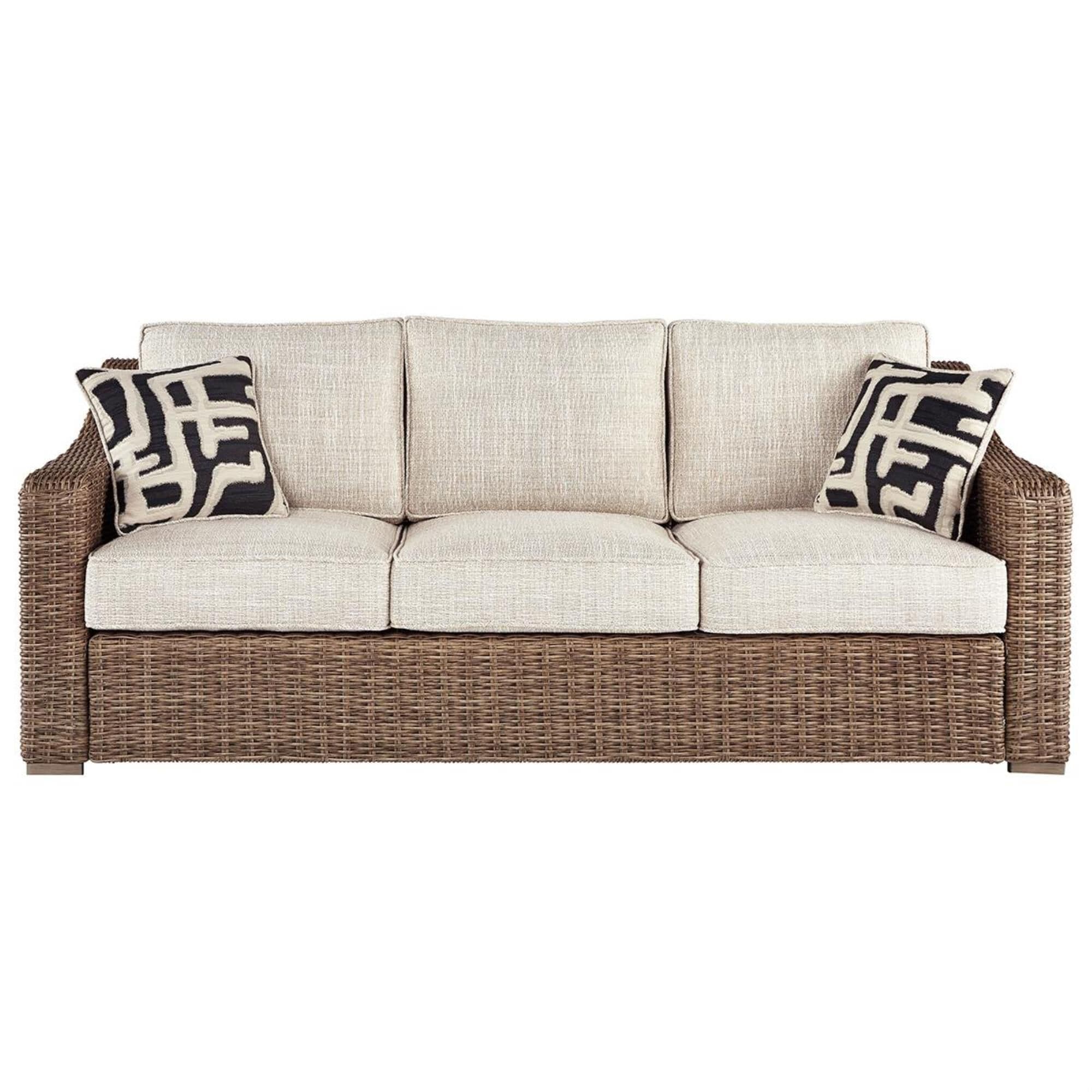 Beige sofa store with blue pillows