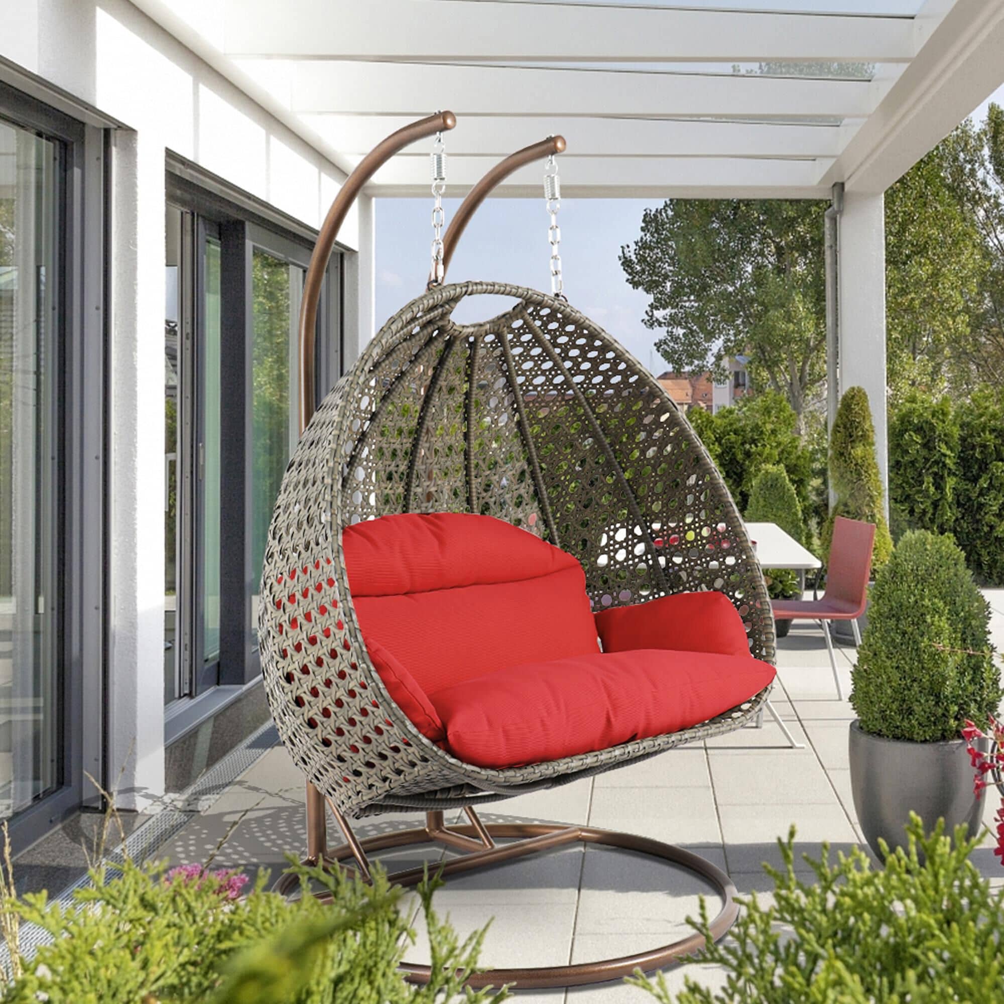 Leisuremod 57 Patio 2 Seat Hanging Egg Swing Chair with Red Cushion in Beige NFM