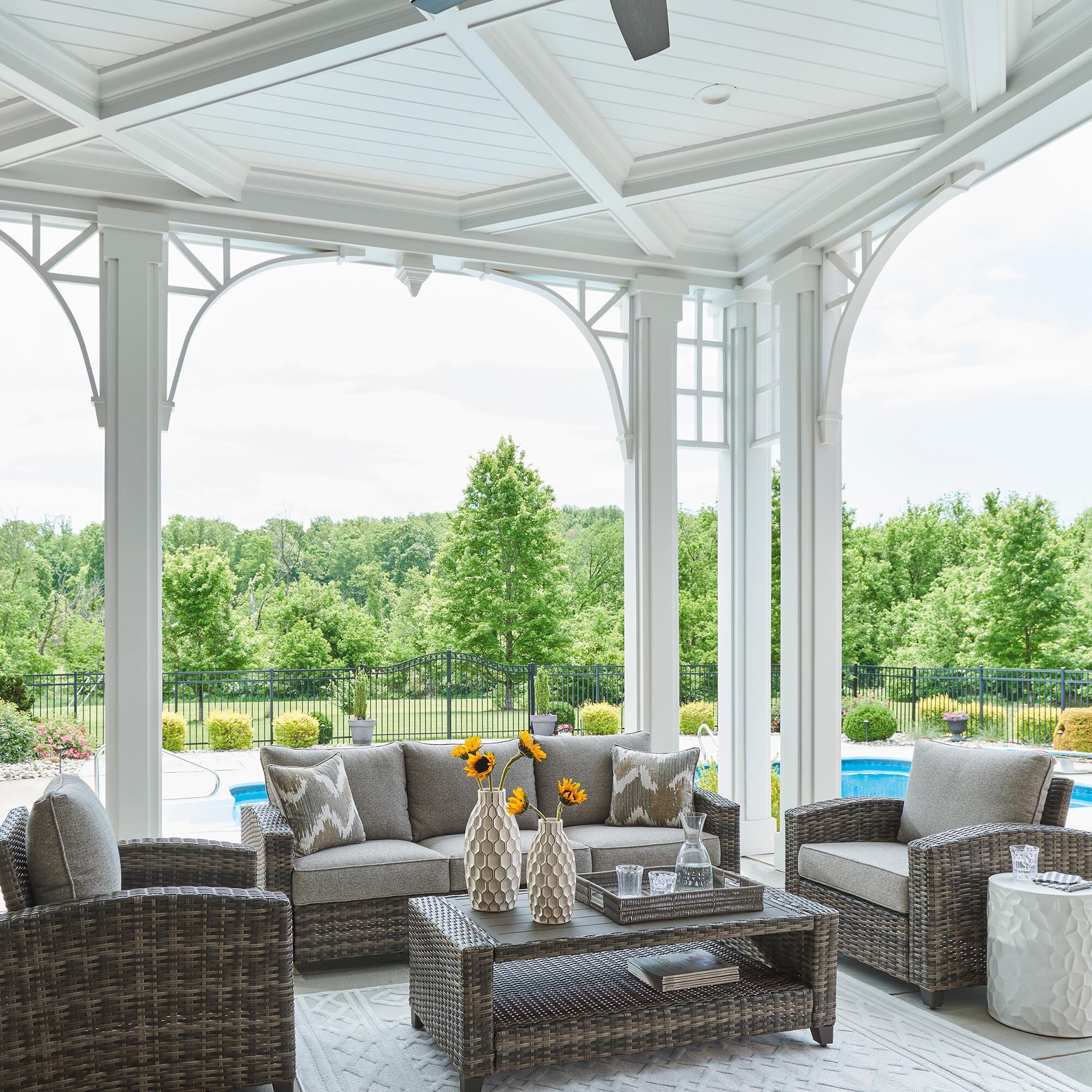 Signature Design by Ashley Oasis Court 4 Piece Patio Conversation Set in Gray NFM