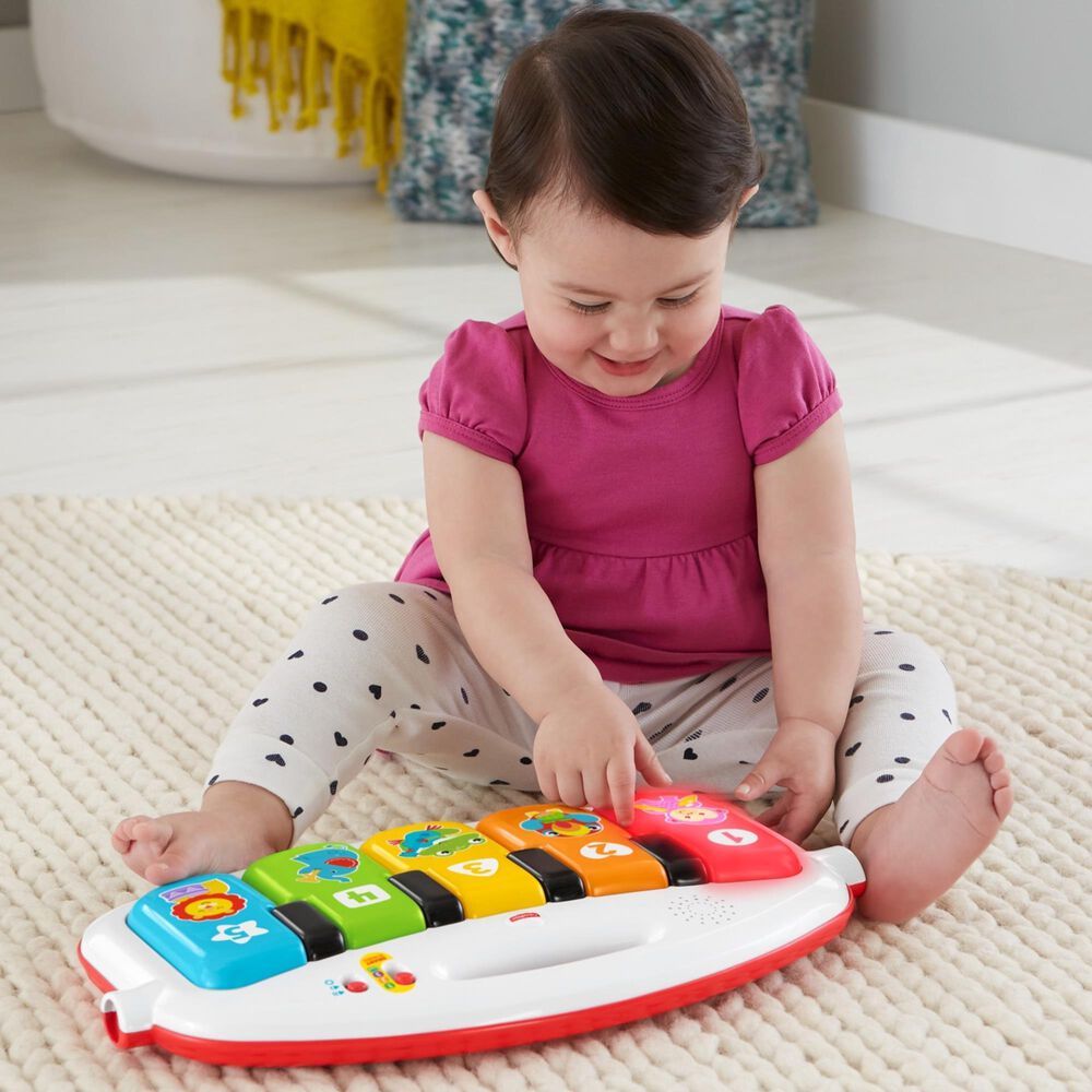 Fisher-Price Deluxe Kick and Play Removable Piano Gym in Green | Shop NFM