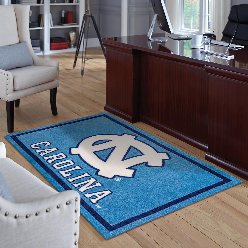 Luxury Sports Rugs NCAA North Carolina Tar Heels 5' x 7'6" Blue Area