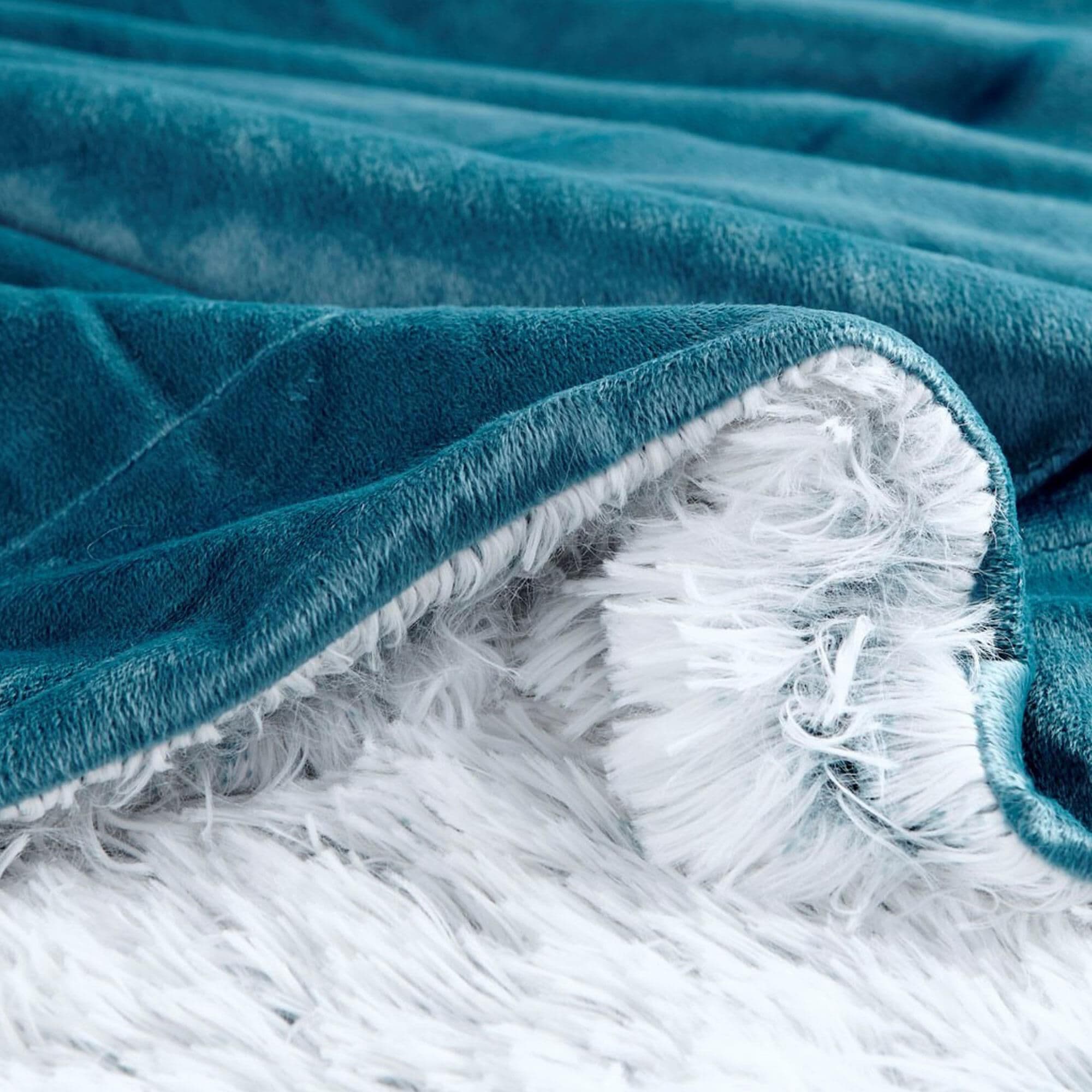 Teal faux on sale fur throw