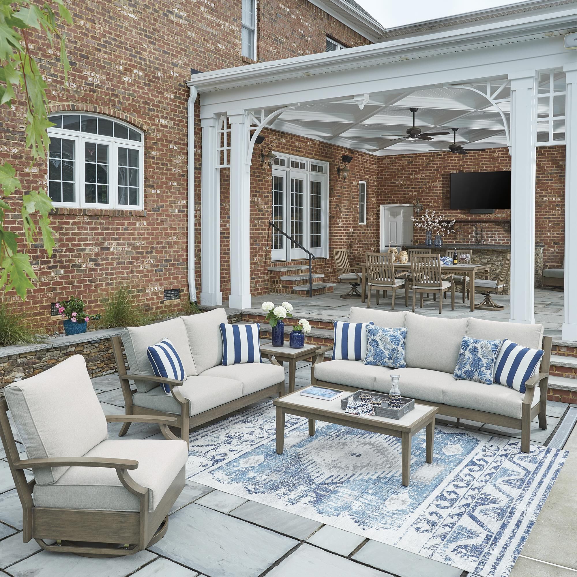 Ashley Rainier 4-Piece Patio Conversation Set in Beige