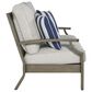 Ashley Rainier Ranch Outdoor Loveseat with Beige Cushion in Brown, , large