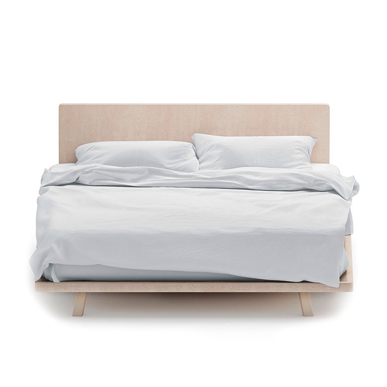 Light wood bed frame with white bedding