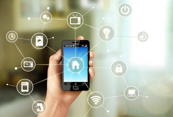 Mobile device held in hand with multiple services and applications shown as a connection
