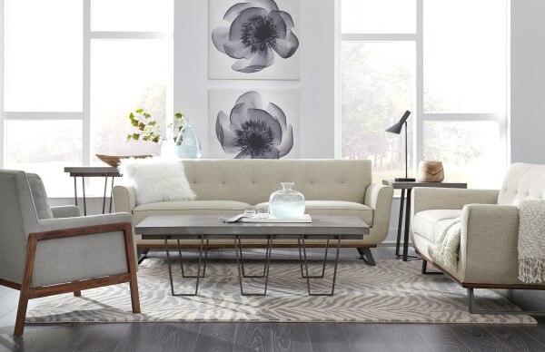 Living room with floral photography on walls and modern furniture