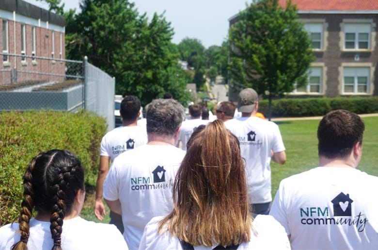 Group of NFM employees volunteering together