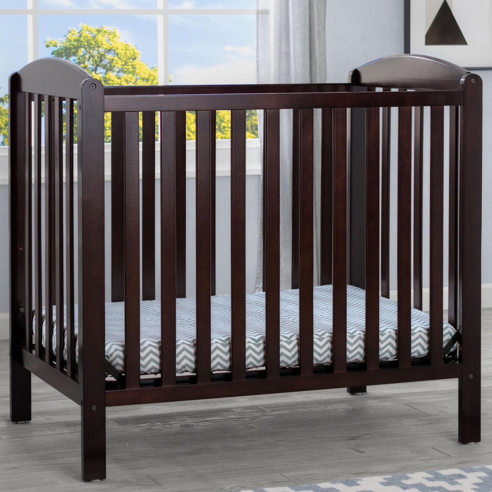 Delta Sprout Mini Crib with Mattress in Dark Chocolate NFM